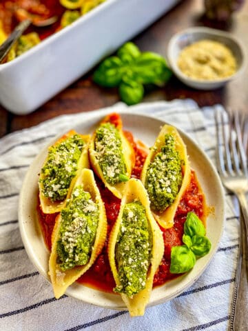 Vegan stuffed shells on plate.
