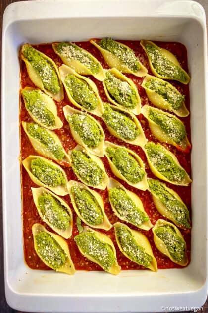 Vegan stuffed shells in baking dish.