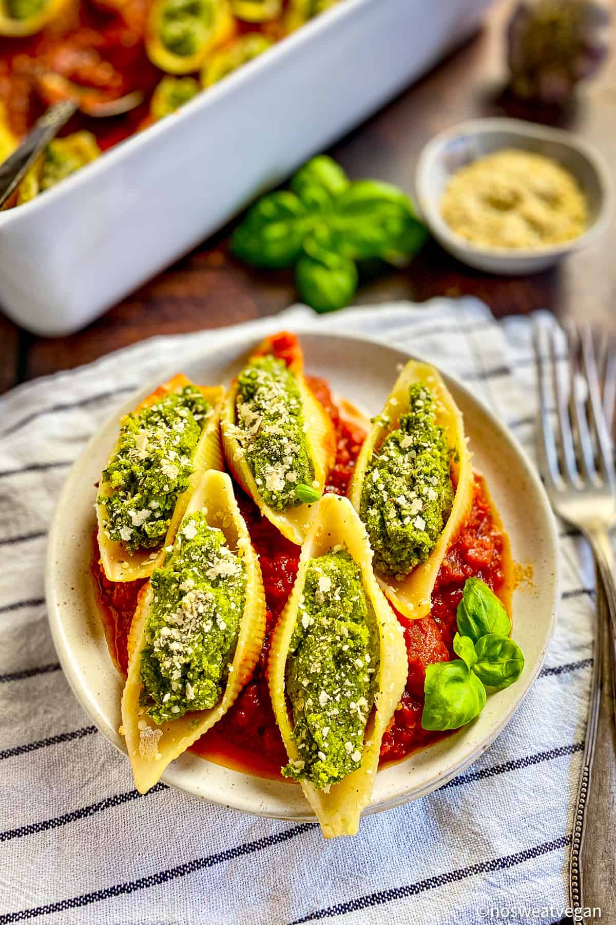 Vegan stuffed shells on plate.