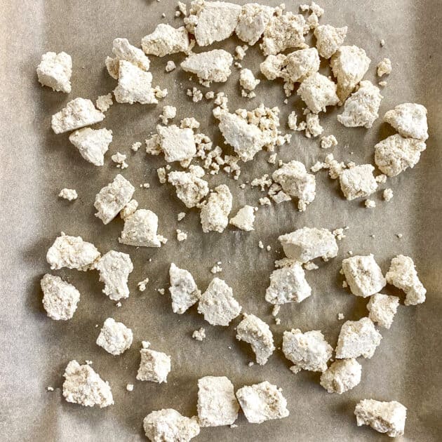 Unbaked tofu on baking sheet.