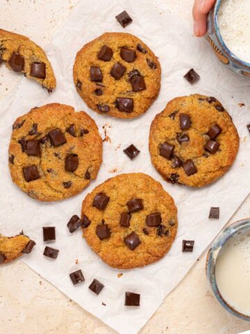 Air fryer chocolate chip cookies on parchment paper.