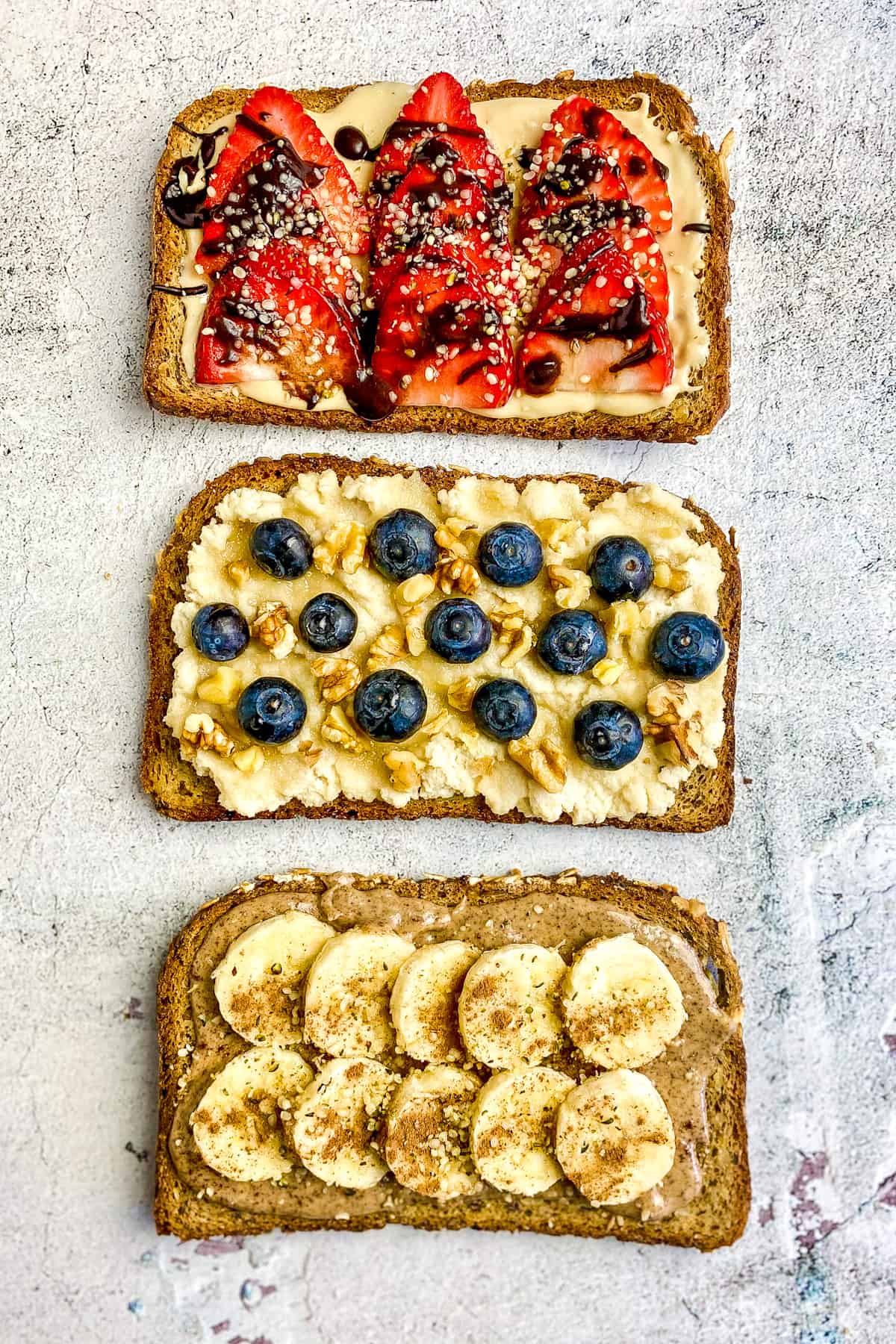 3 toasts with sweet toppings.