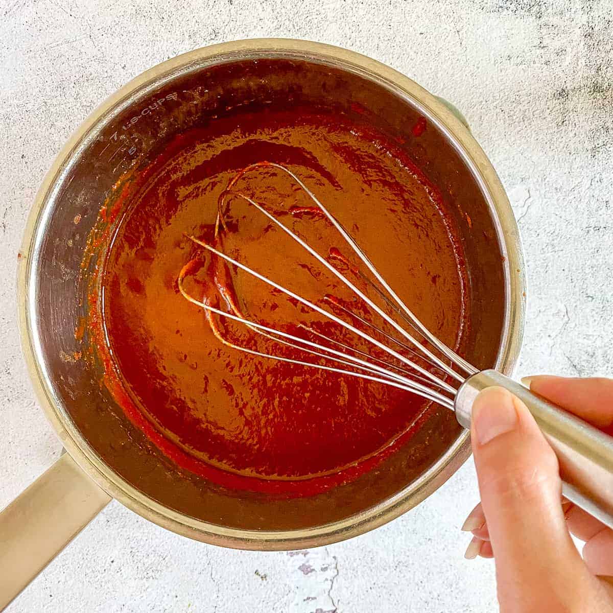 Stir the homemade bbq sauce.