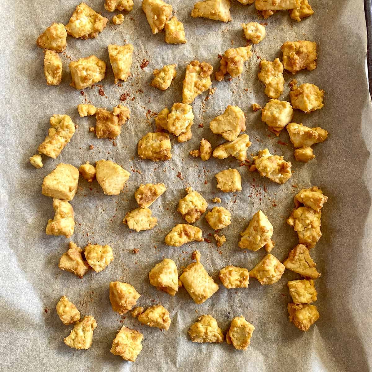 Baked tofu on baking sheet.