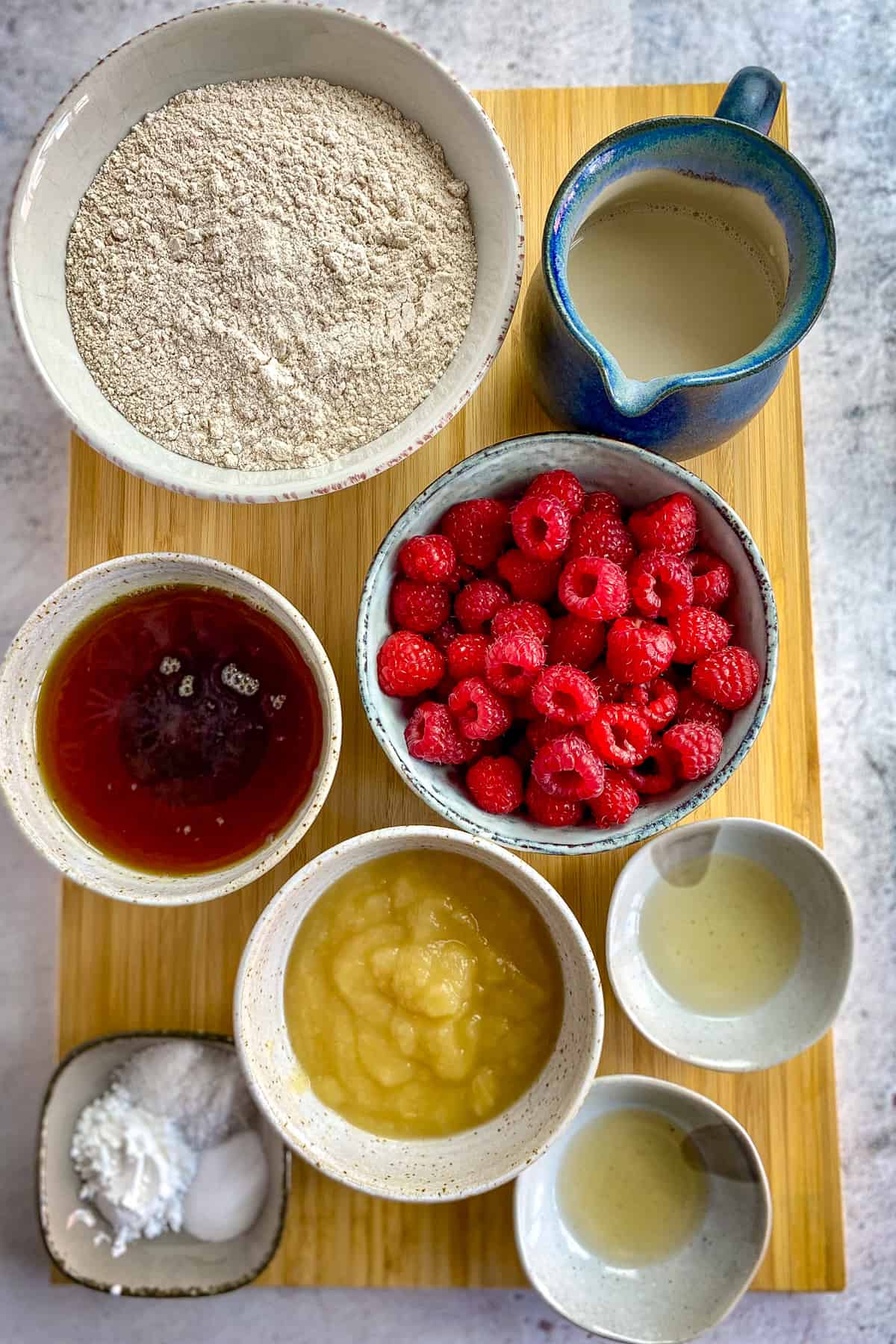 Ingredients for vegan raspberry muffins.