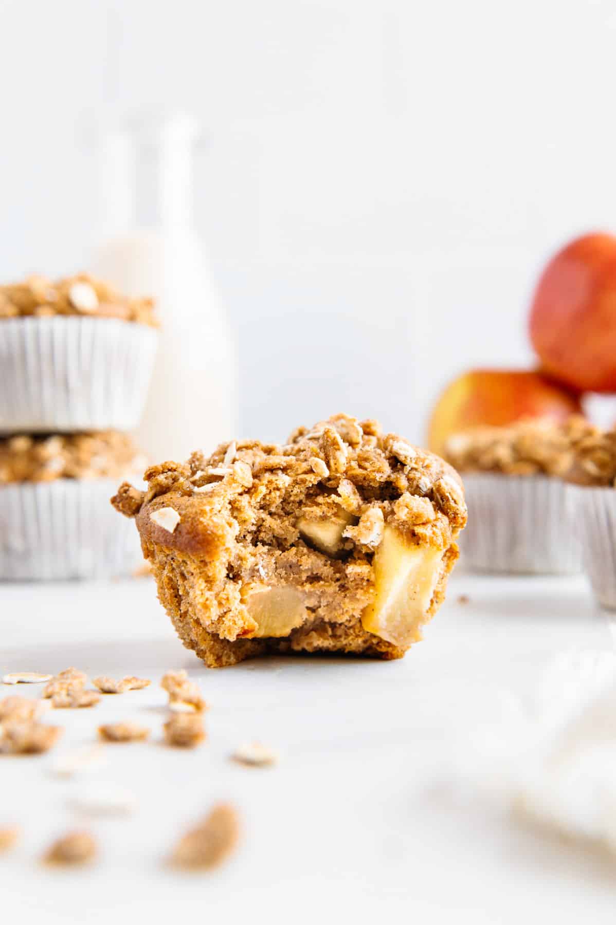Oil-free apple muffin with bite taken out.