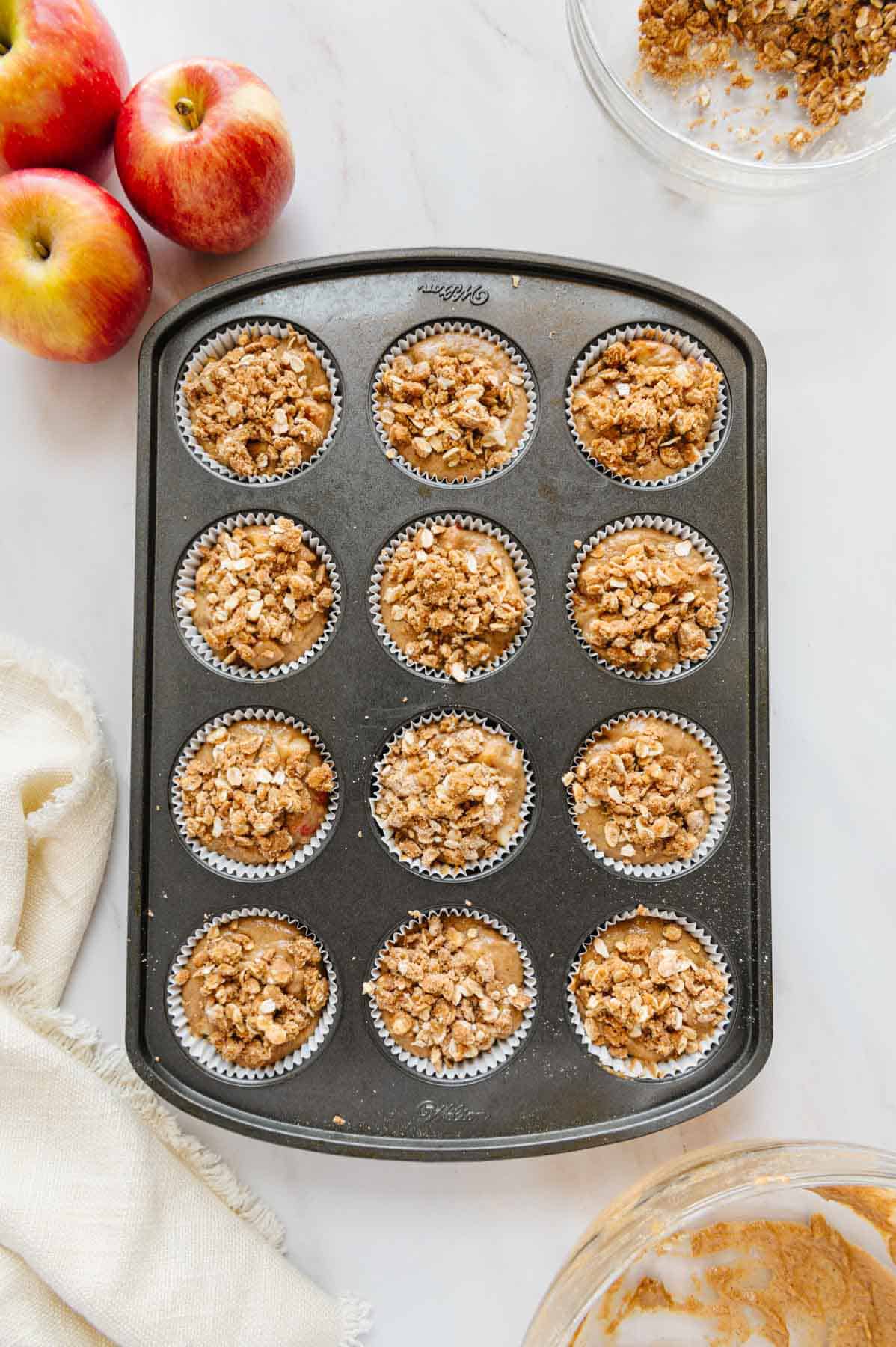 Uncooked vegan muffins in form.