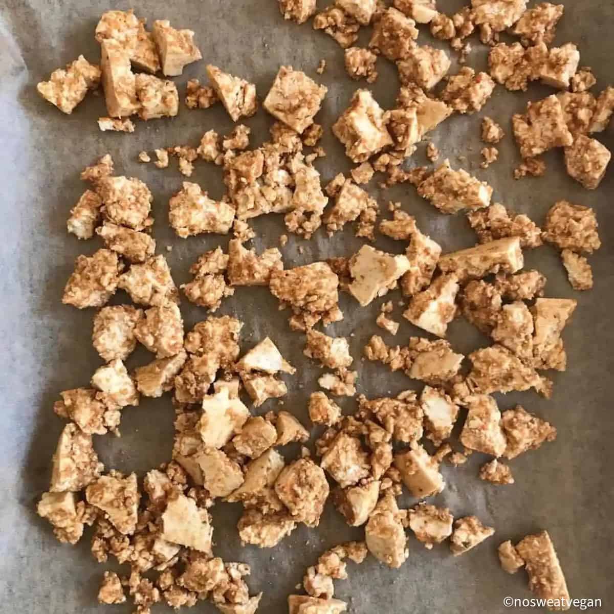 Tofu on a baking sheet.