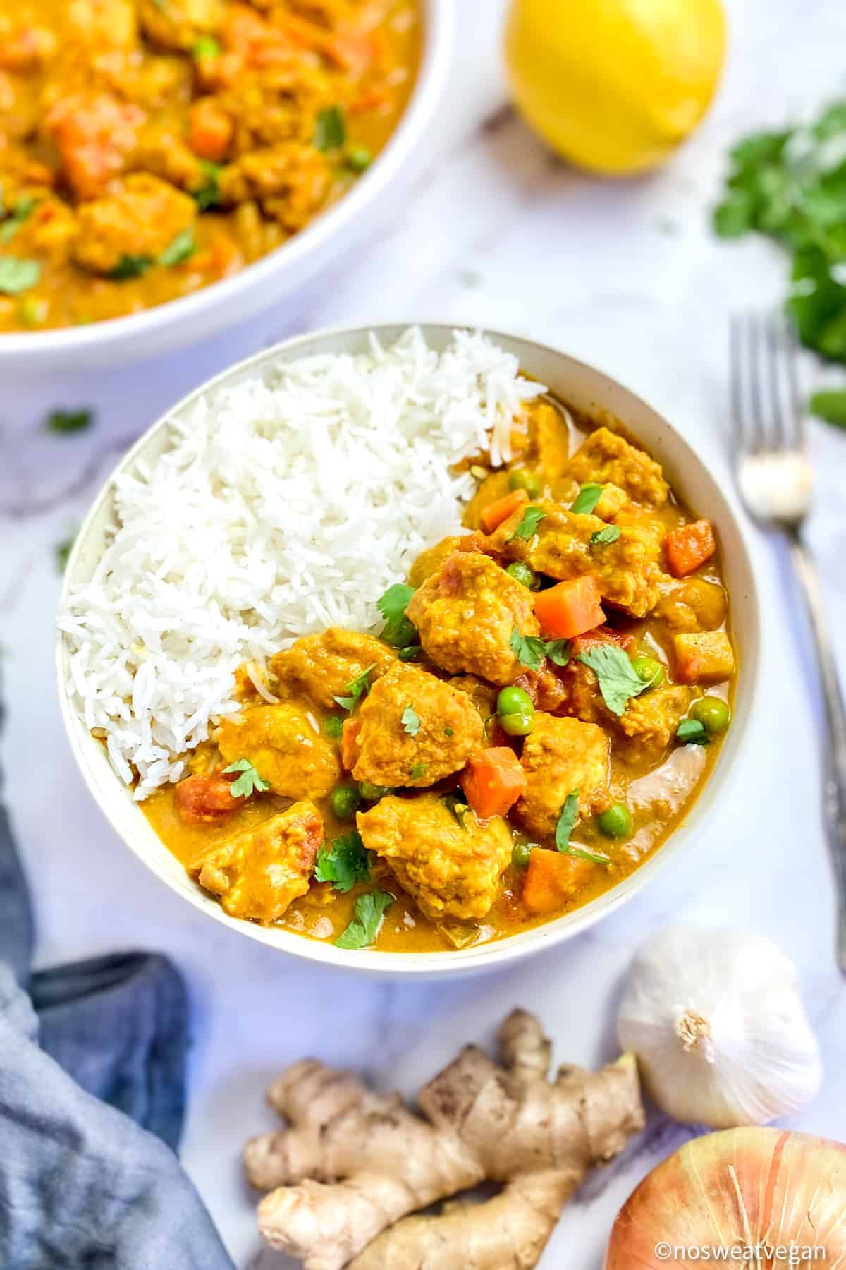 Curry with tofu and mixed vegetables in a bowl.