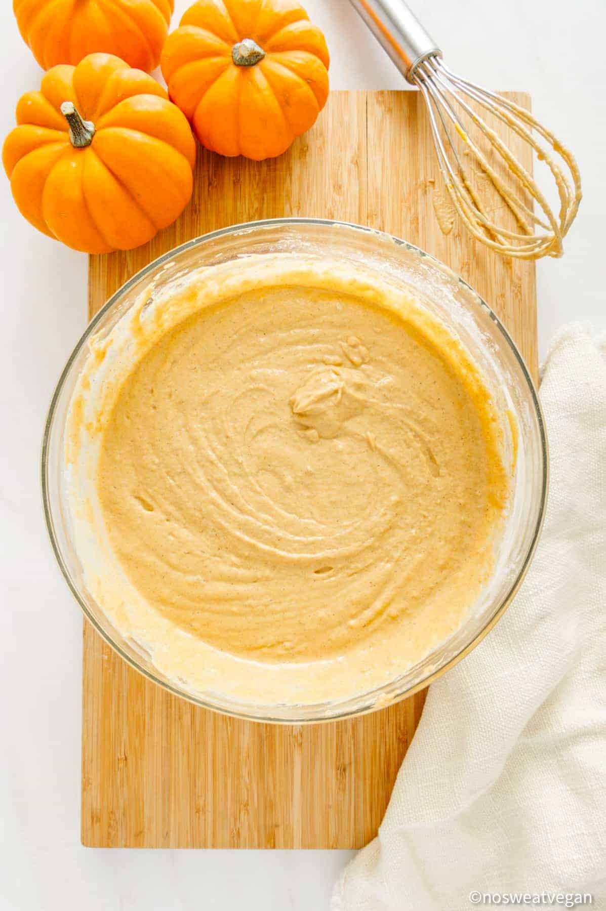 Oil-free pumpkin pancakes wet ingredients mixed in a bowl.