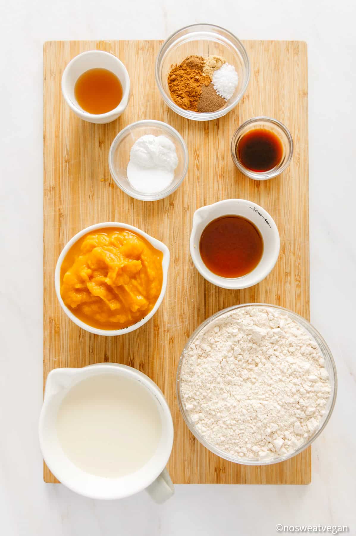 Vegan pumpkin pancake ingredients on a cutting board.