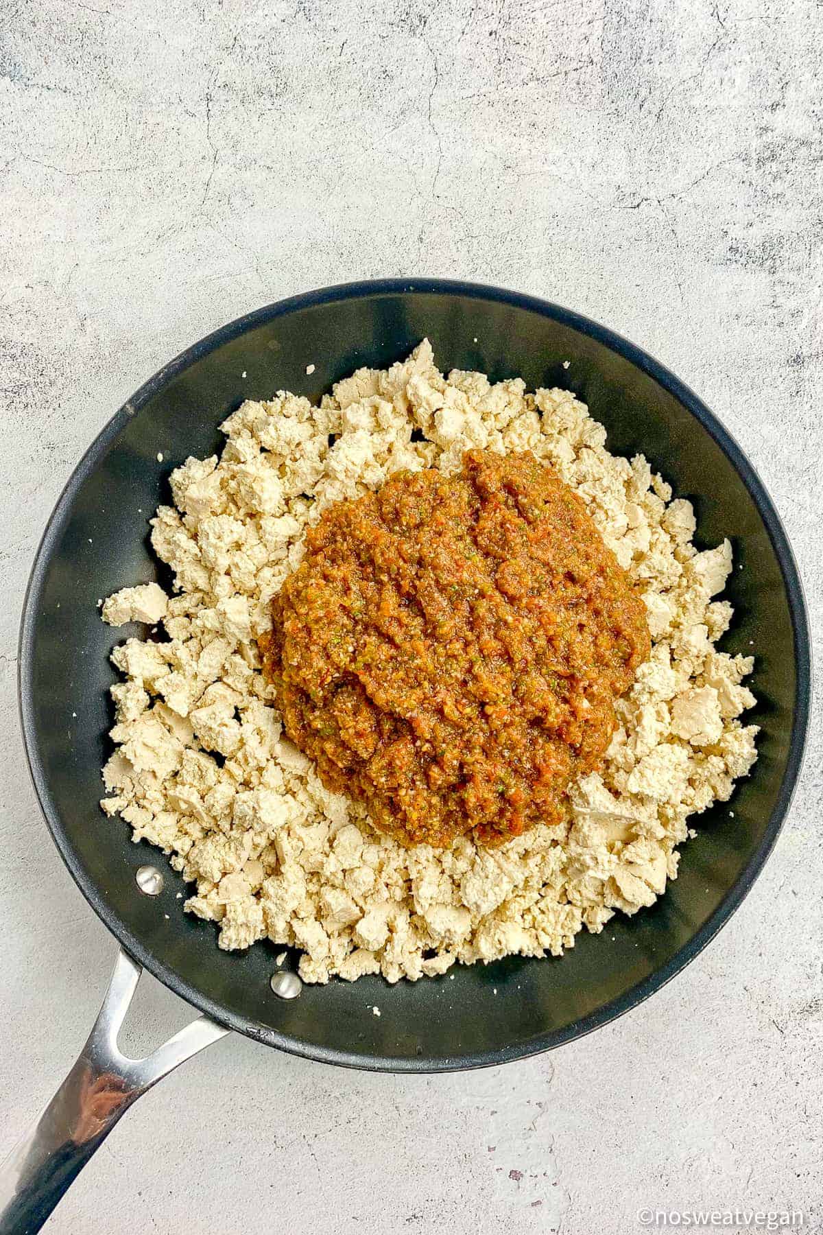 Sofritas tofu and sauce in a skillet.