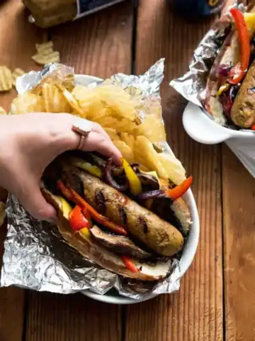 Vegan beer sausages on a bun.