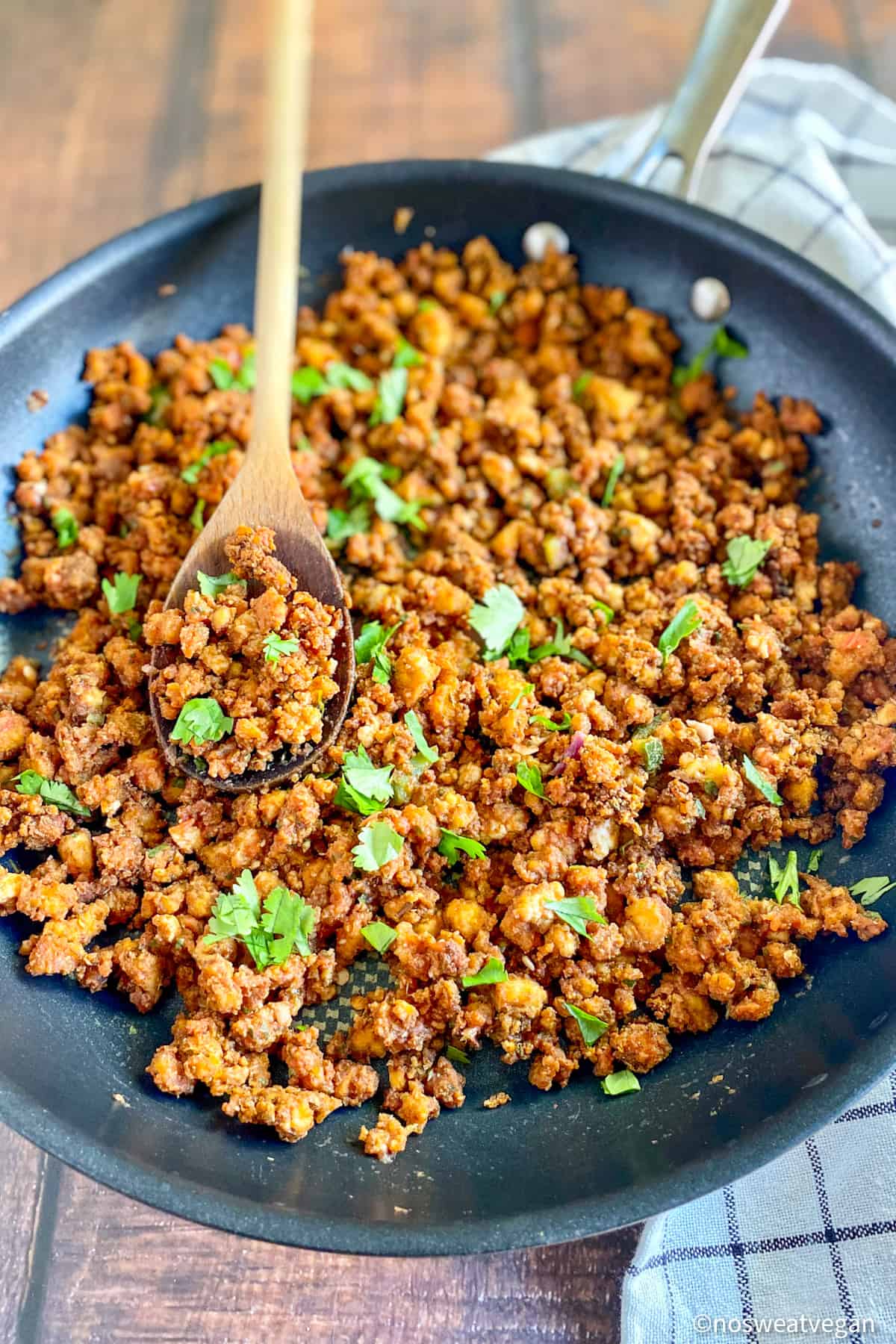 Tofu taco crumbles in a skillet.