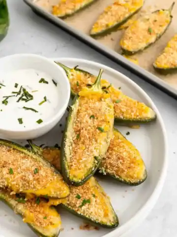 Vegan jalapeno poppers on a plate.
