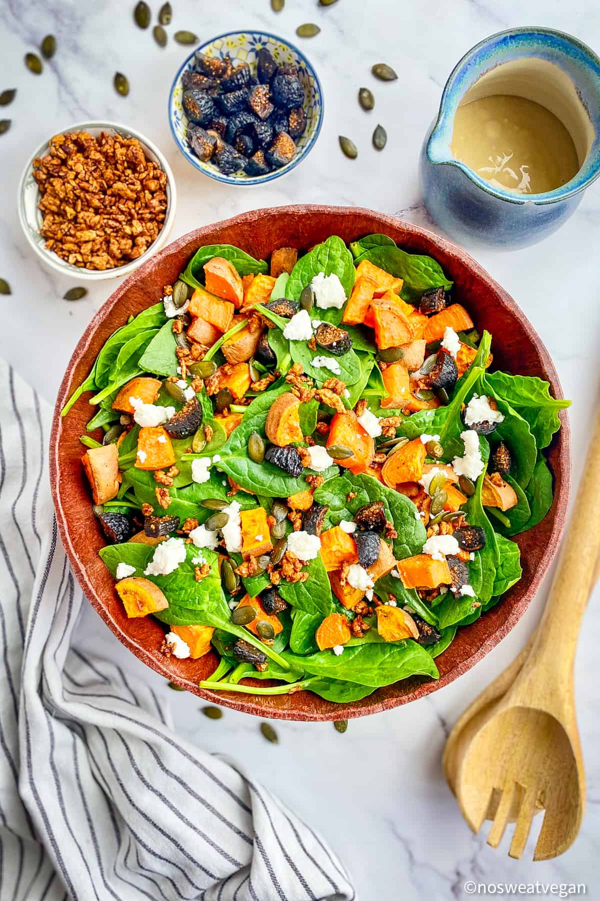 Spinach sweet potato salad in a bowl.