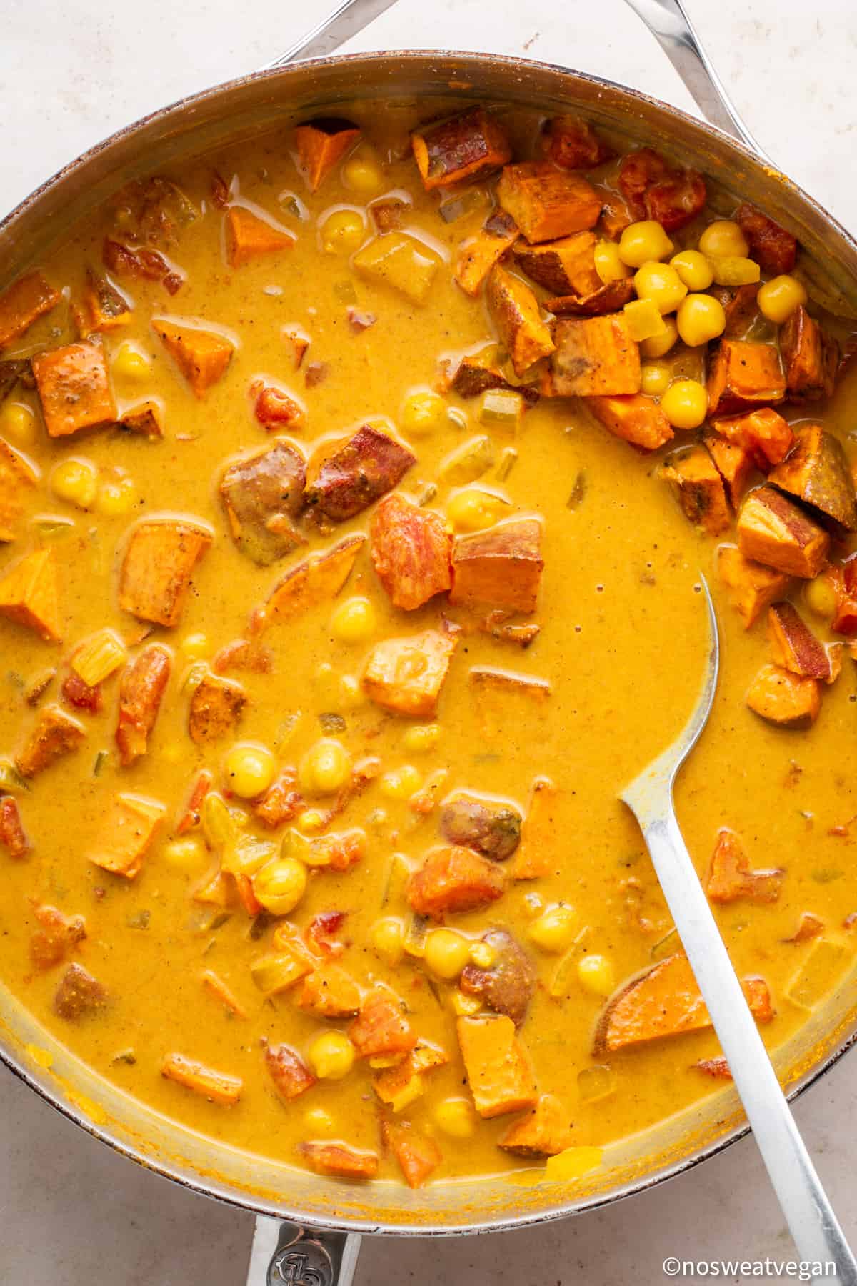Chickpea sweet potato curry in a skillet.