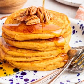 Vegan sweet potato pancakes on a plate.