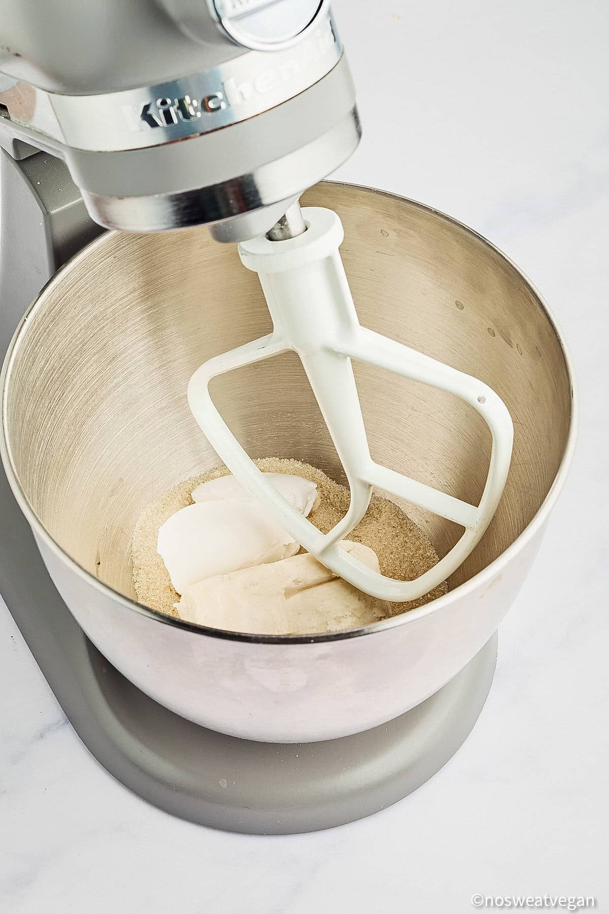 Vegan red velvet cookies butter and sugar in a mixer.