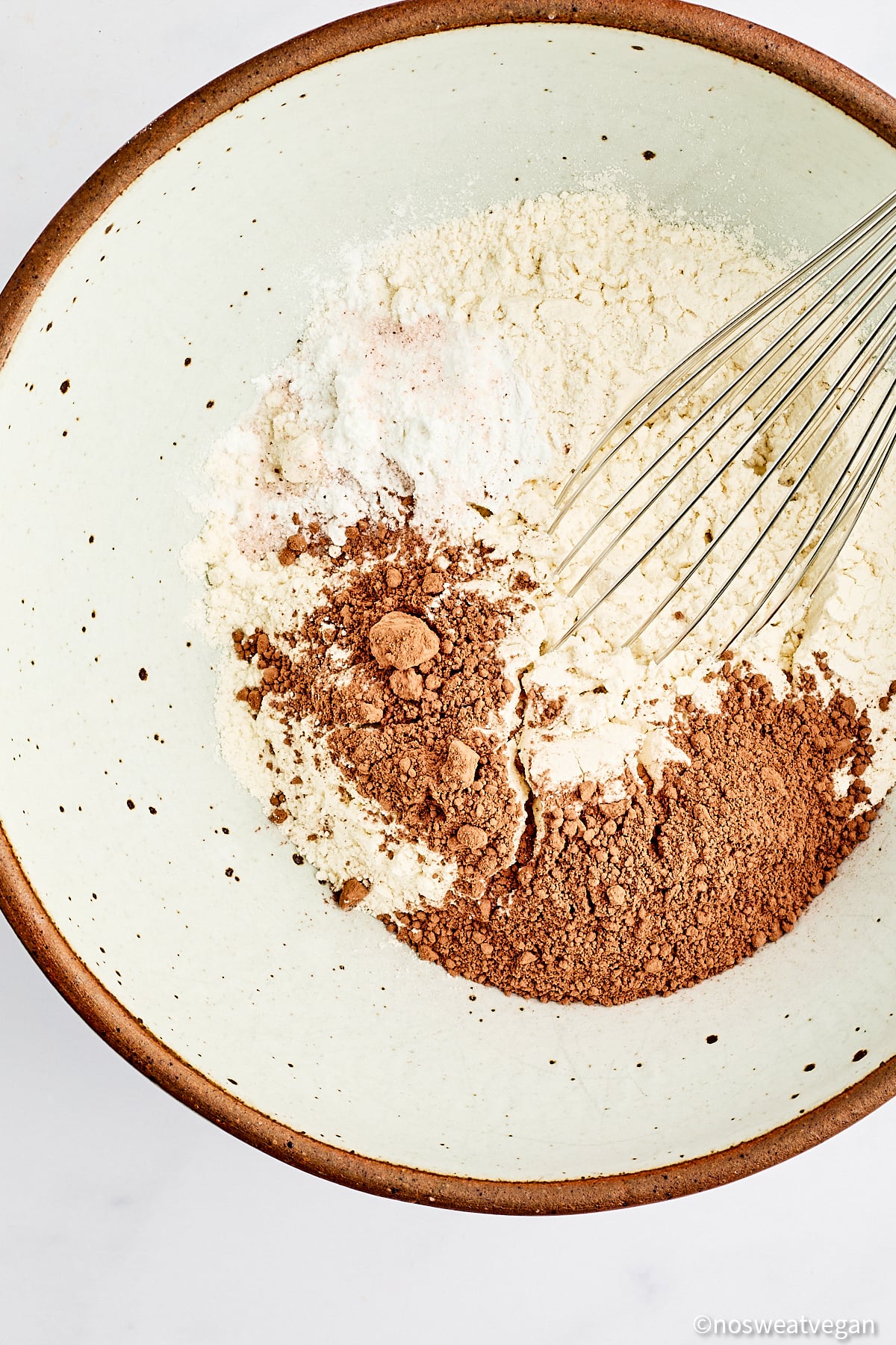 Vegan red velvet cookies dry ingredients in a bowl.