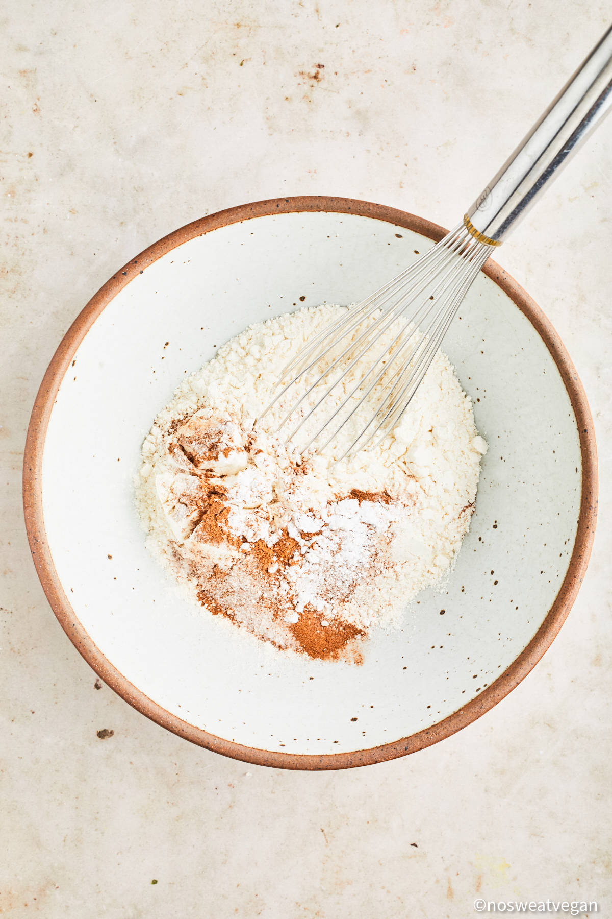 Vegan snickerdoodle dry ingredients in a bowl.