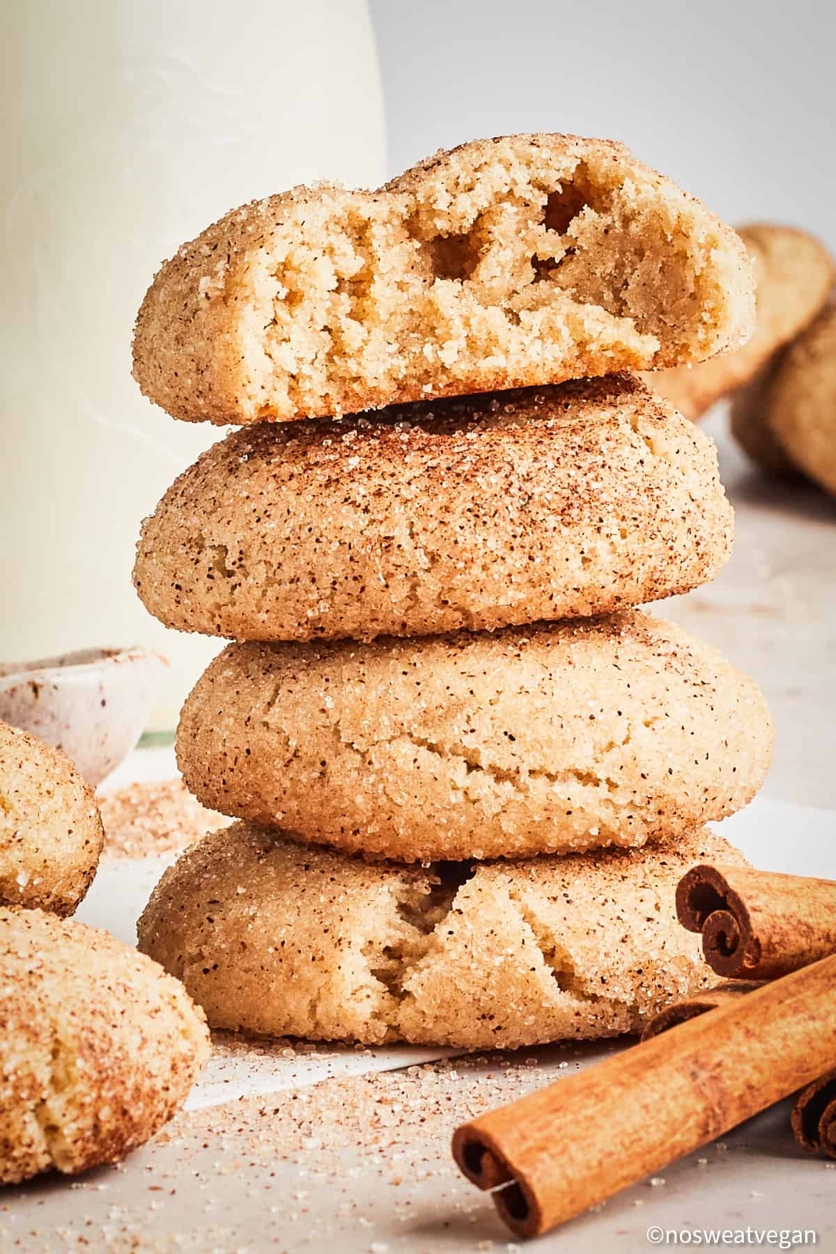 Vegan snickerdoodle cookies stacked.