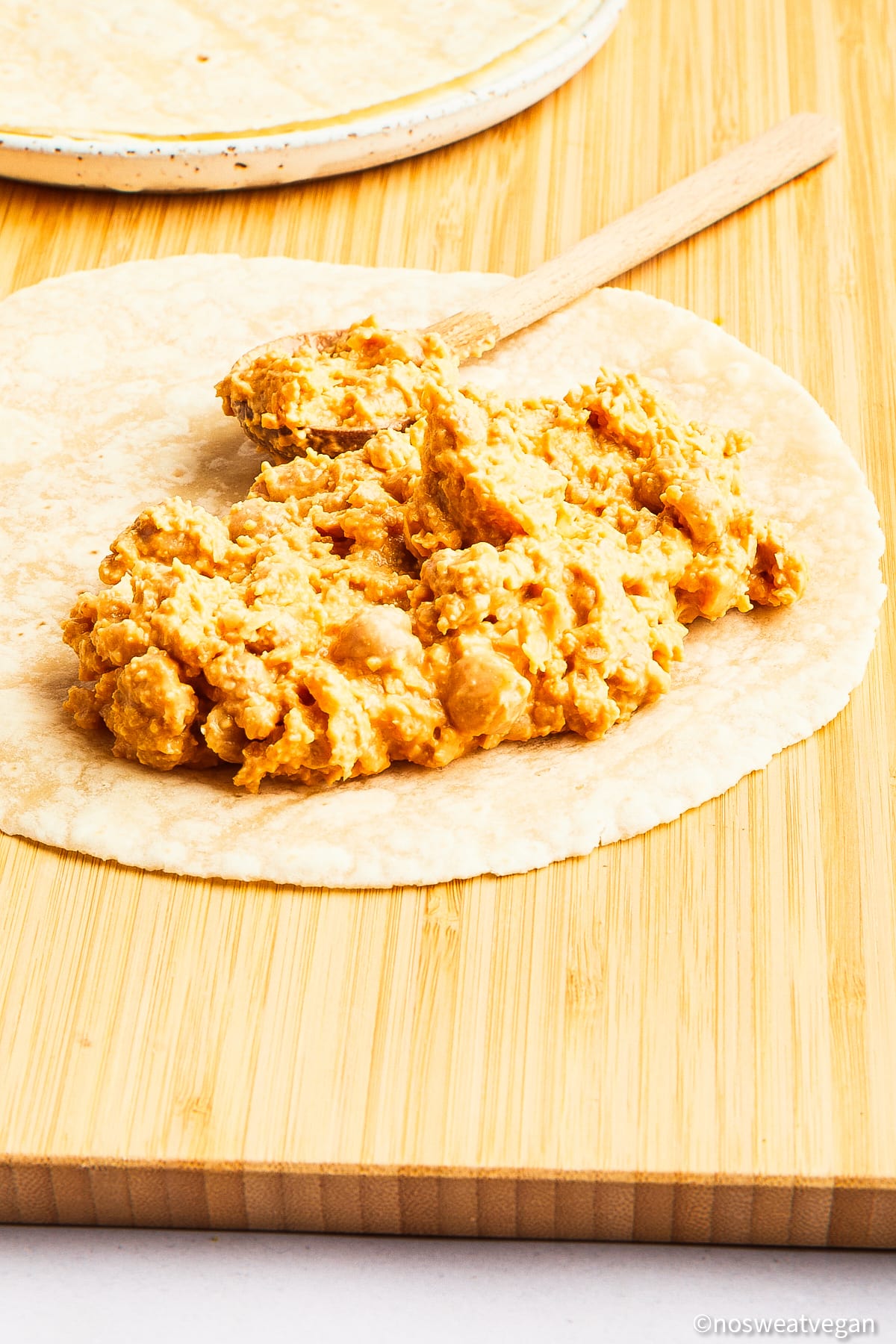 Buffalo chickpea filling on a tortilla.
