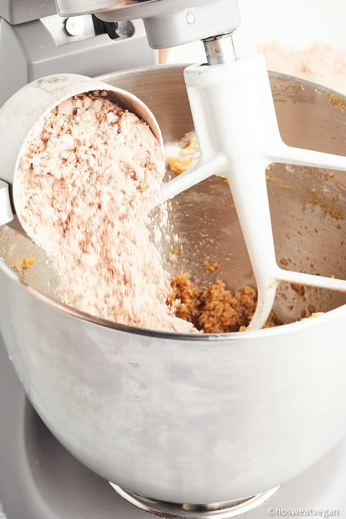 Flour added to a mixer.