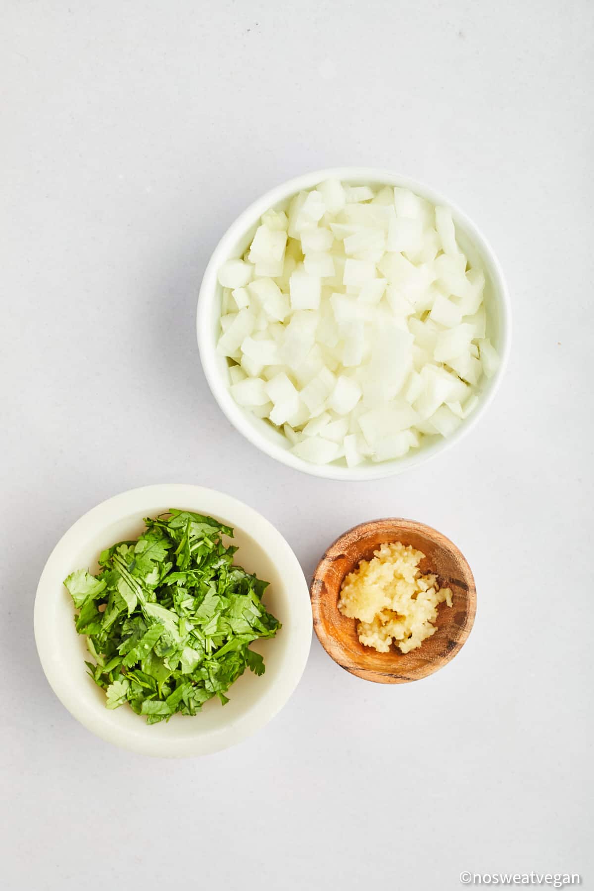 Diced onions, chopped cilantro, and minced garlic.