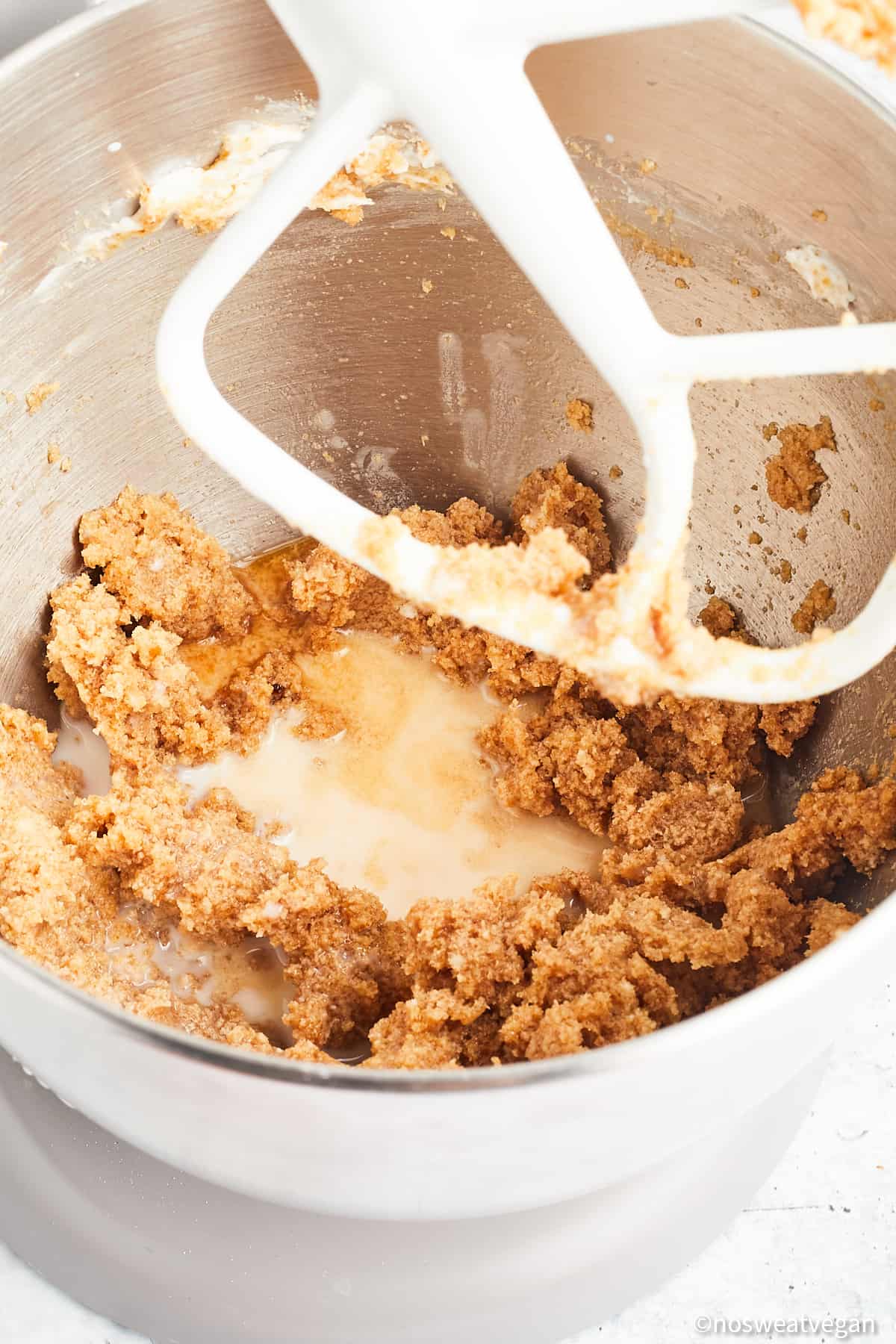 Powdered sugar and butter in a mixer.