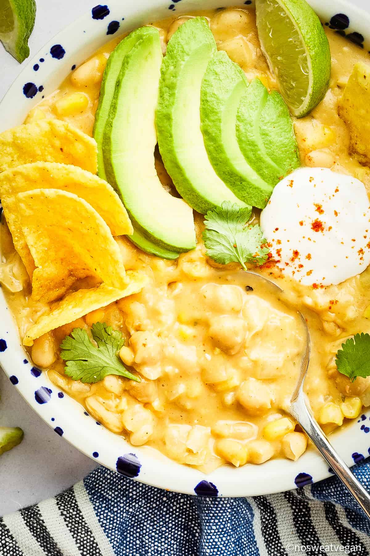 Closeup of vegan white bean chili in a bowl.