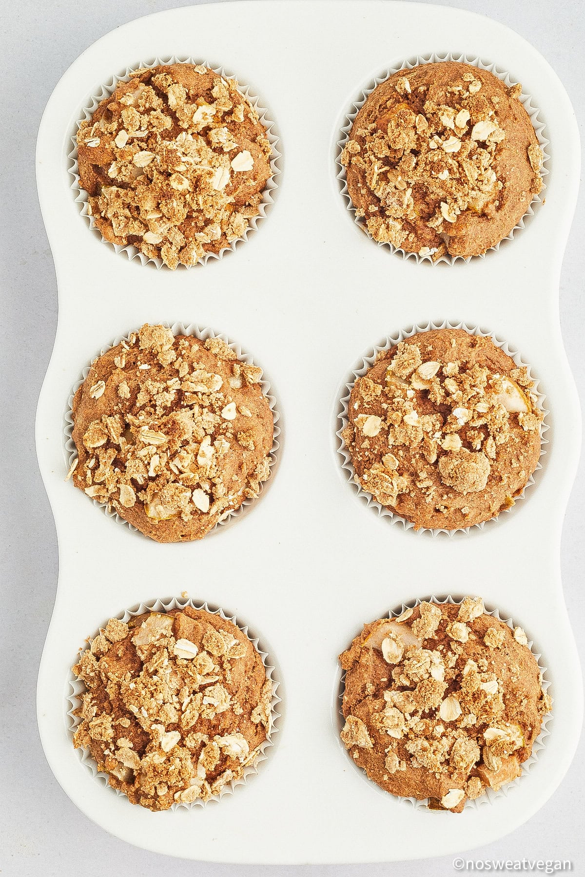 Baked vegan pear muffins.