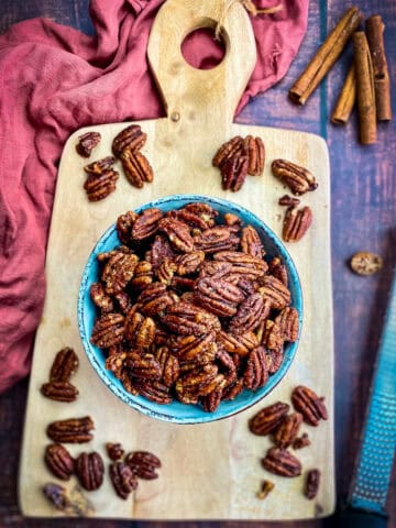 Air fryer candied pecans in a bowl.