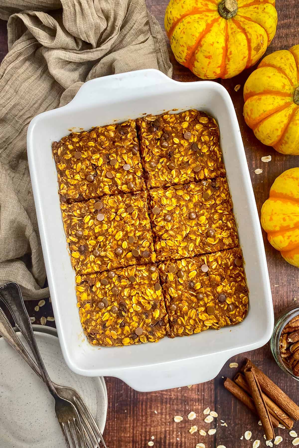 Baked pumpkin oatmeal cut into six squares.