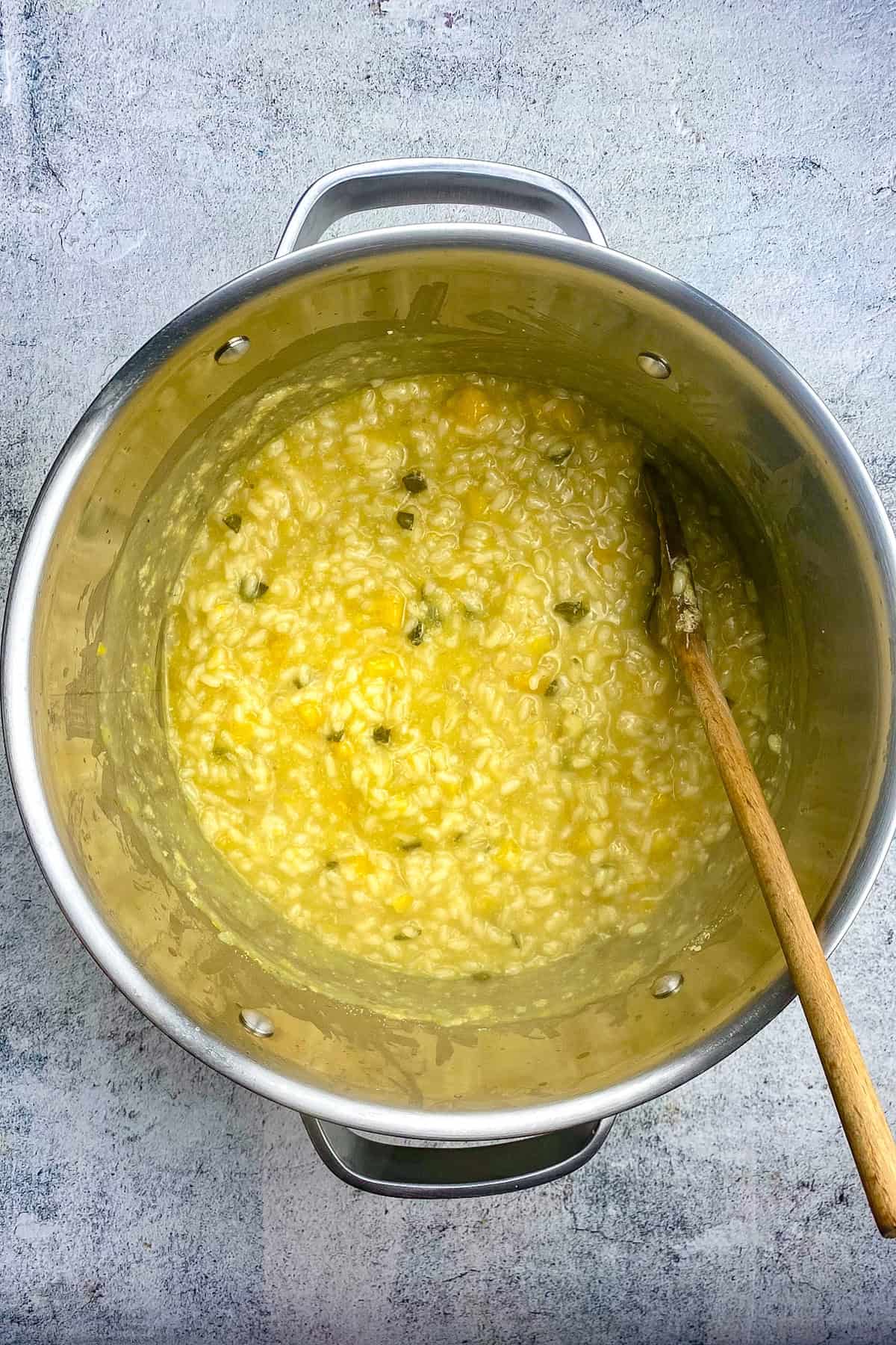 Vegan pumpkin risotto in a pot.